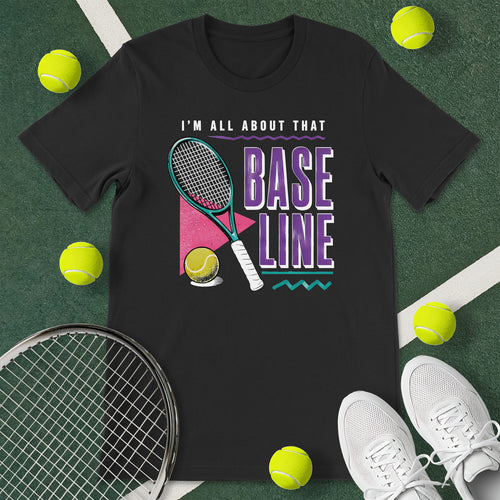 Black t-shirt with the text 'I'M ALL ABOUT THAT BASELINE' and a graphic of a tennis racket and tennis ball.