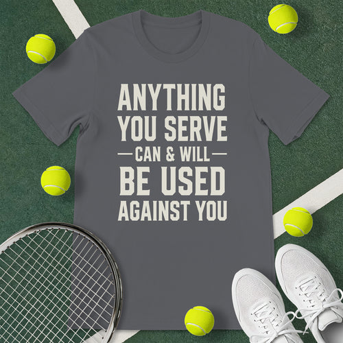 Charcoal grey t-shirt with the tennis inspired text 'ANYTHING YOU SERVE CAN & WILL BE USED AGAINST YOU.' 