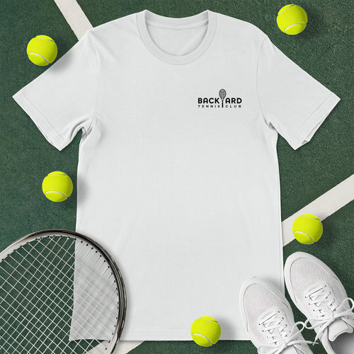White t-shirt with the Backyard Tennis Club logo in the left chest area. The logo features a tennis racket.