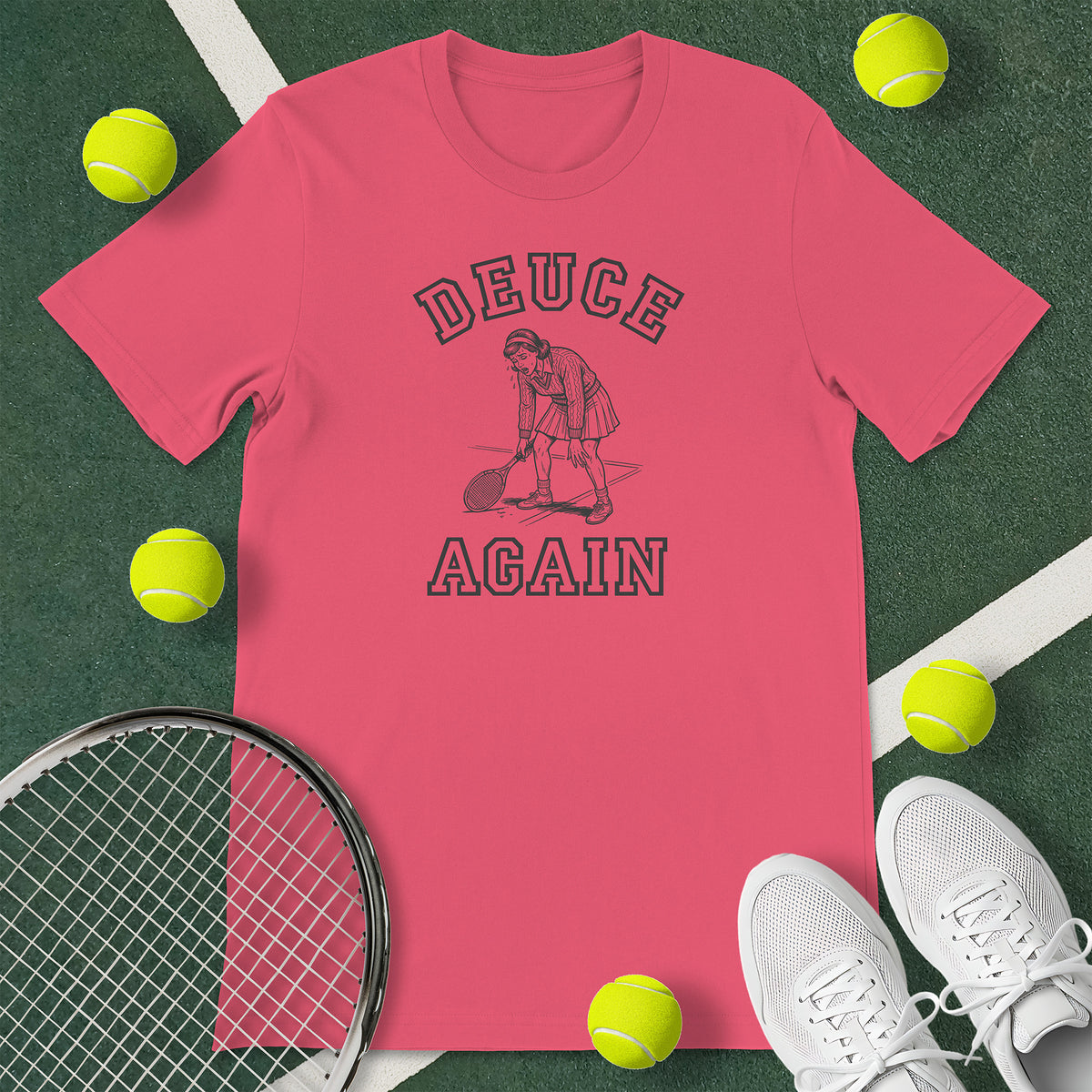 Coral t-shirt with the text 'DEUCE AGAIN' and a graphic of a tired female tennis player.