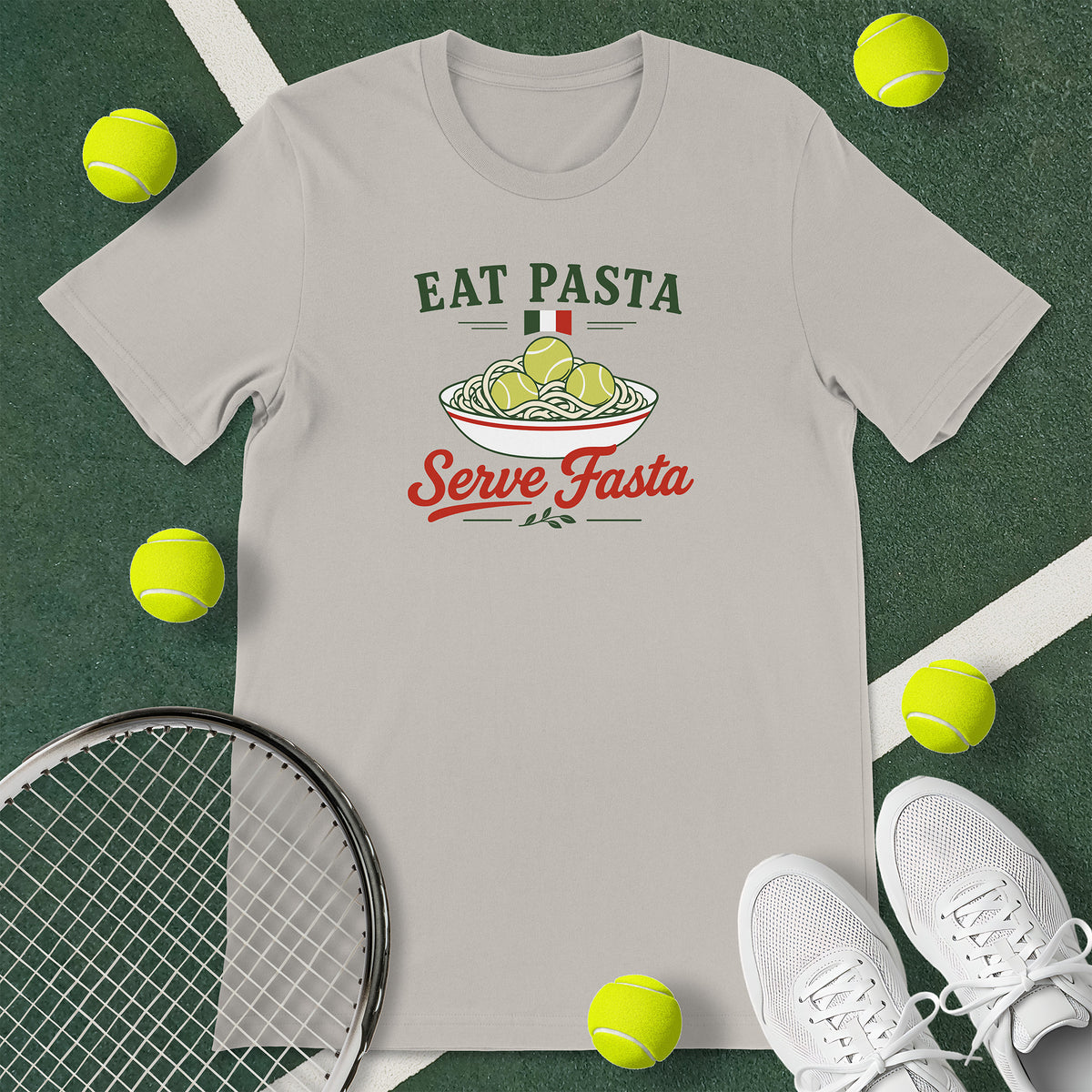 Light grey t-shirt with the text 'EAT PASTA Serve Fasta' and a graphic of a bowl of spaghetti with tennis balls instead of meatballs.