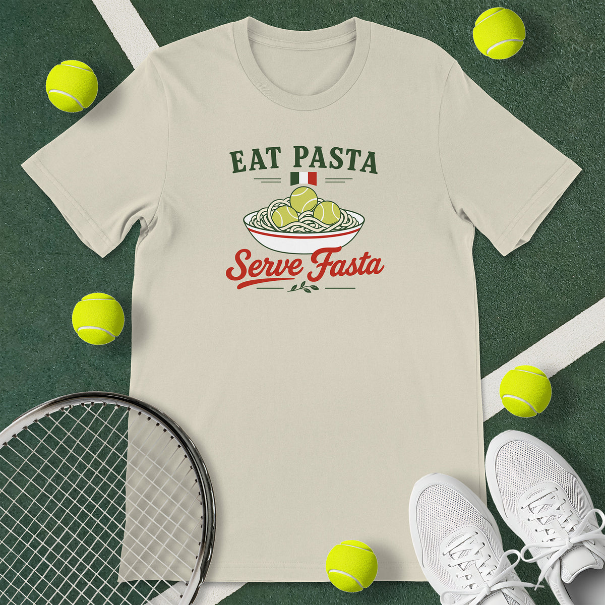 Off-white t-shirt with the text 'EAT PASTA Serve Fasta' and a graphic of a bowl of spaghetti with tennis balls instead of meatballs.