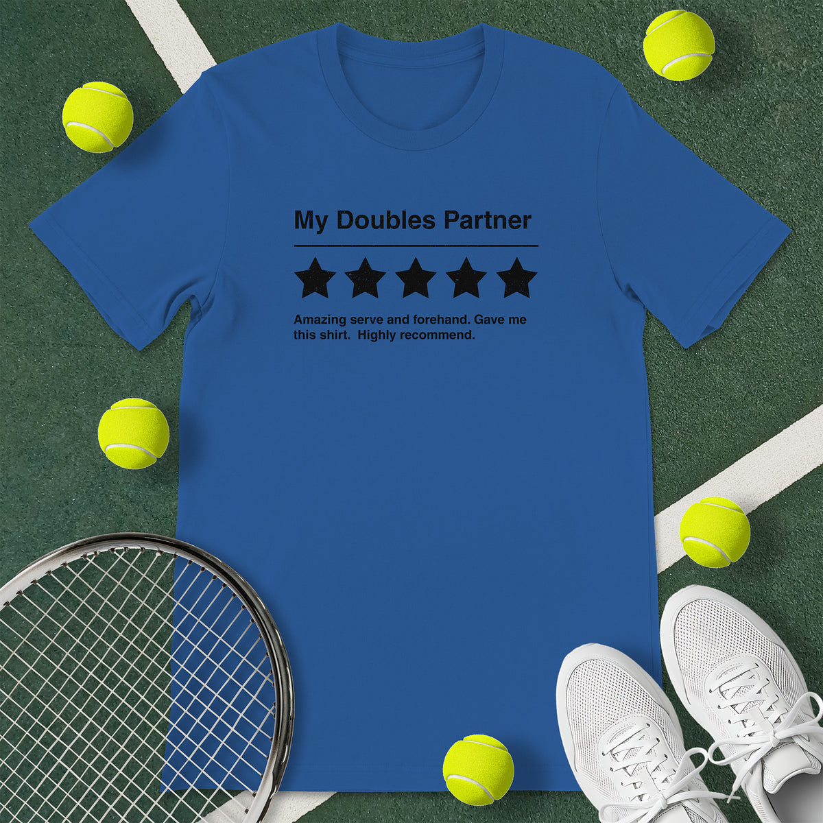 Royal blue t-shirt with the text 'My Doubles Partner - Amazing serve and forehand. Gave me this shirt. High recommend.' and a graphic of 5 stars.